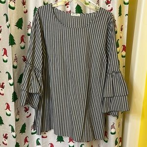 Grey and white vertical striped 3/4 length sleeve shirt